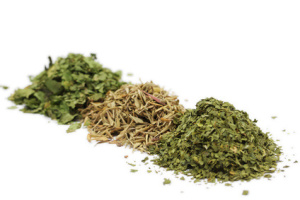 Small piles of various herbs